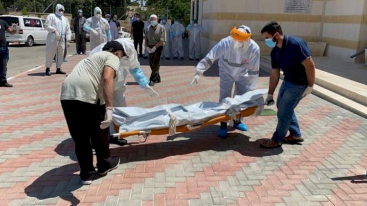 دفن حالة وفاة بكورونا في الخليل