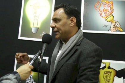 رسام  كاركاتير : معرض "عرفات هوية وطن" الشهيد أبوعمار قلعة تضخ السلام حول العالم