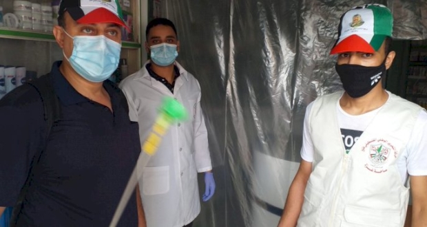 متطوعو تيار الاصلاح الديمقراطي شمال غزة يقومون بتعقيم المنازل والمباني والمحلات التجارية