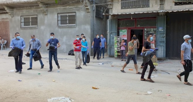 كوادر فتح بخانيونس ينفذون حملة مخيمنا جميل 